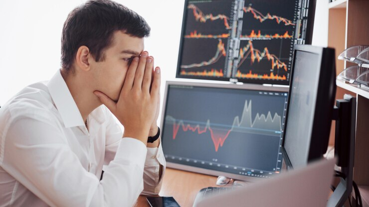 Frustrated business owner looking at Google Ads dashboard with high clicks but low conversions.