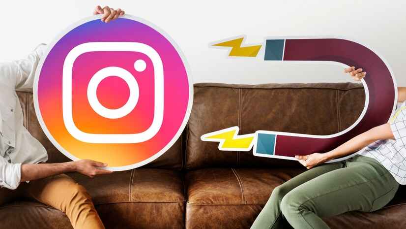 One person holding an Instagram logo while another person holds a magnet, representing how to leverage the new Instagram music feature for increased engagement.