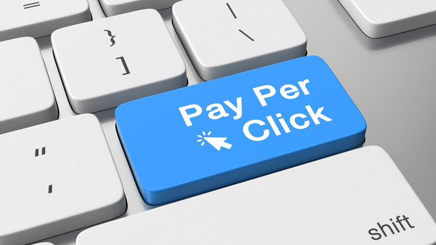 Blue keyboard key labeled ‘Pay Per Click,’ symbolizing digital advertising and the mechanics behind PPC campaigns.