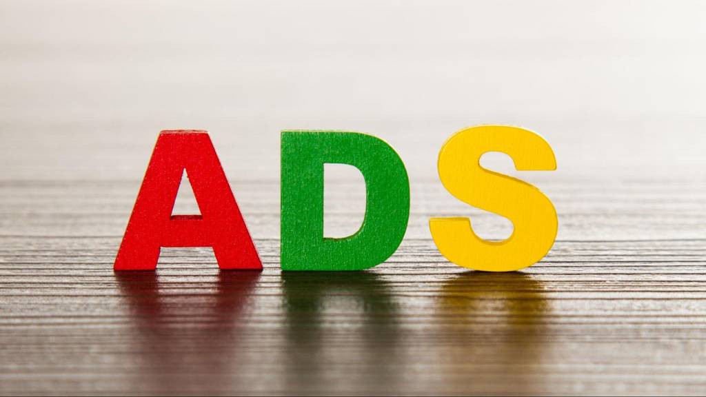 Colorful wooden letters spelling ADS for digital marketing strategy to fix a silent sales killer website
