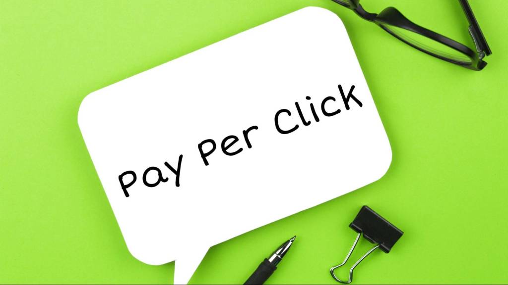 Pay-per-click concept on green background representing digital marketing mistake of relying only on paid ads.