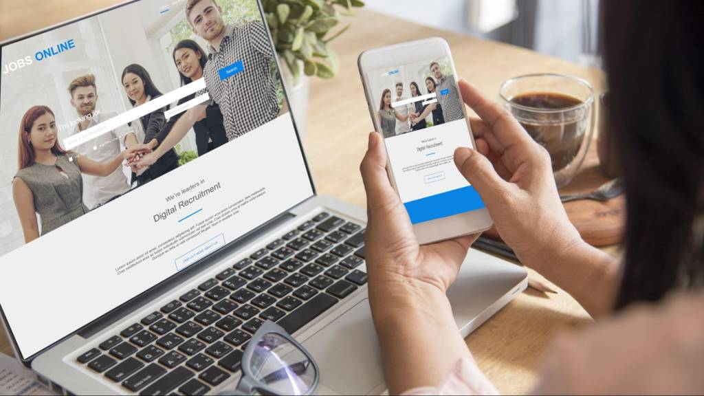 Small business owner managing local SEO maintenance tasks on a laptop to improve search visibility