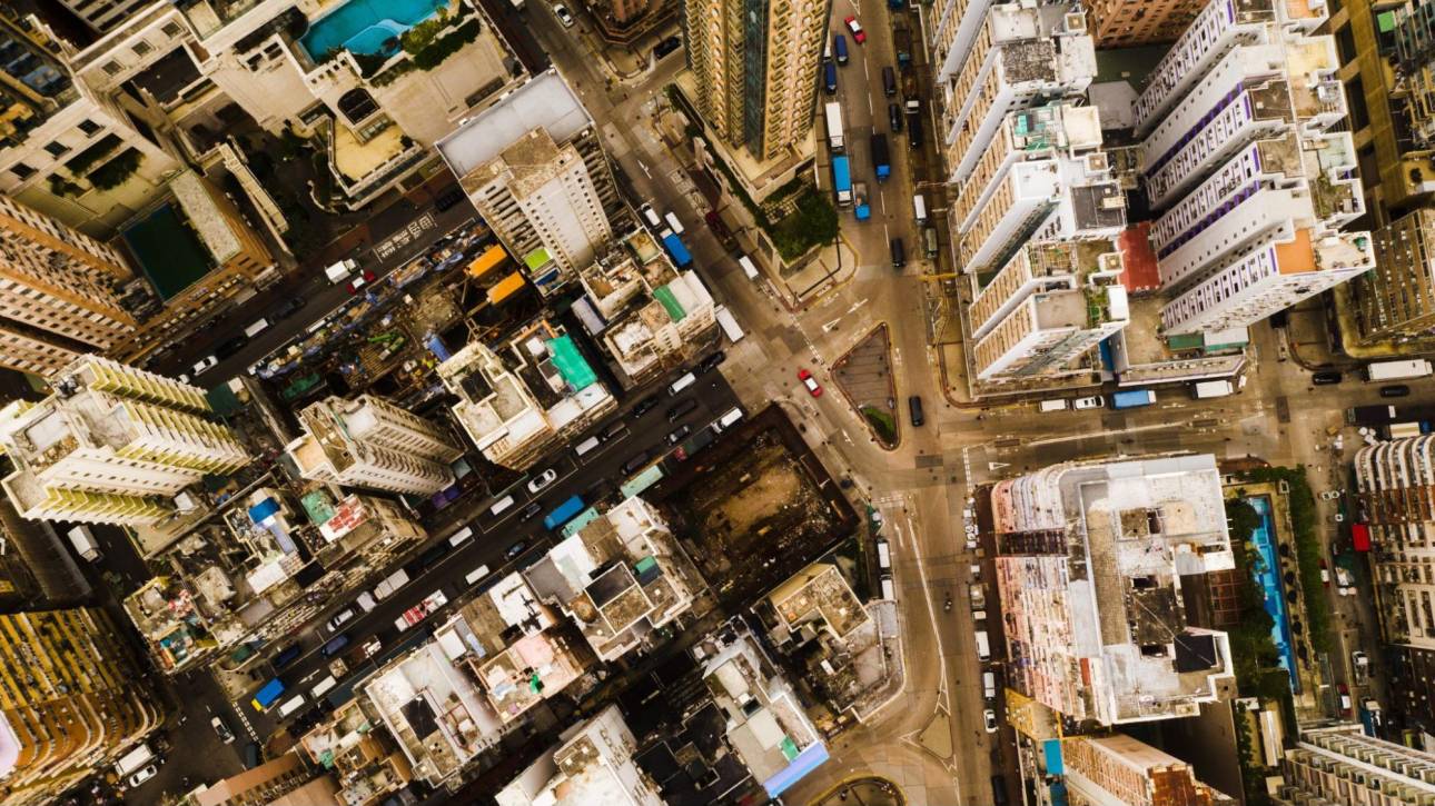 ew of a dense city intersection representing multi-location service territories.